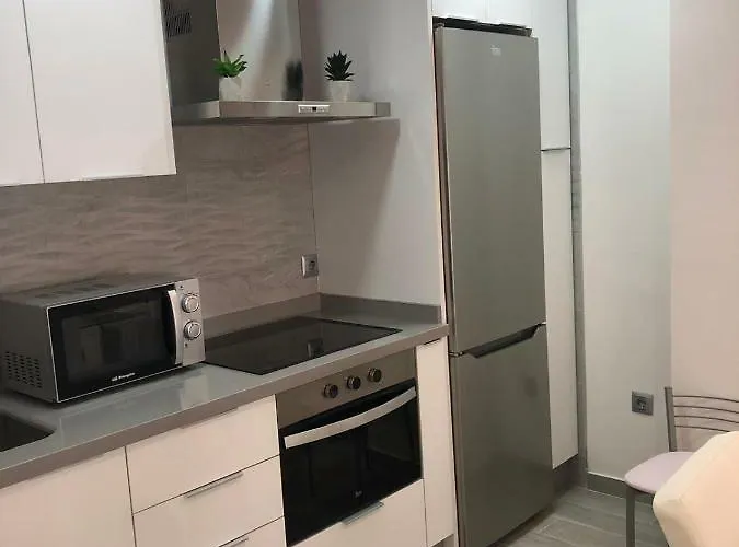 128 Espinel Апартаменты